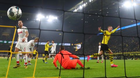 Håland celebrates after scoring  Dortmund's fourth goal against Koln.