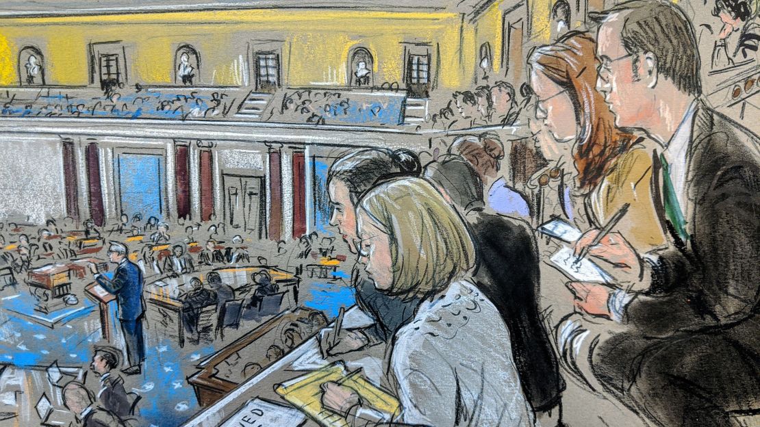 Trump attorney Pat Cipollone speaks as reporters watch at the Senate impeachment trial; January 25, 2020