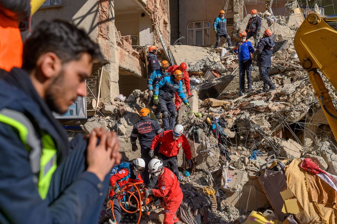 Rescue workers search through the rubble in Elazig on Saturday.
