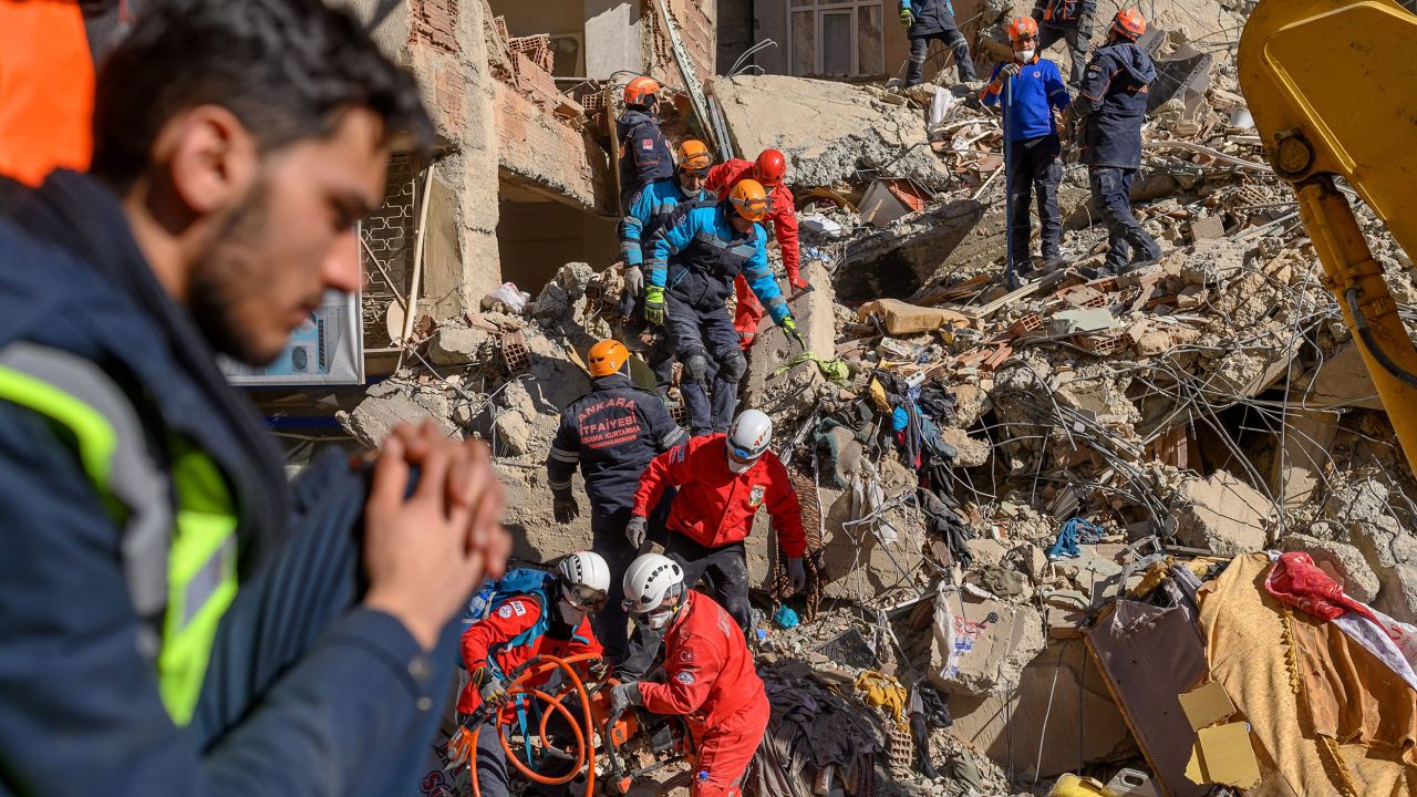 Rescue workers search through the rubble in Elazig on Saturday.
