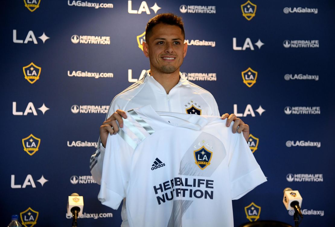 Hernandez poses with his jersey during a press conference.
