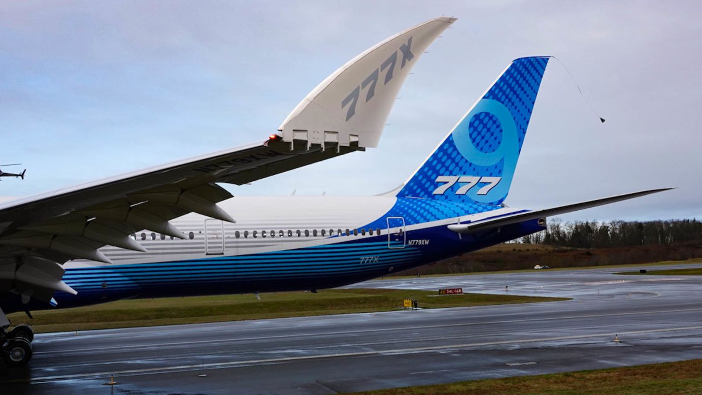 <strong>Folding wings:</strong> Each wing on the 777X-9 is the largest single composite structure in the world.<br />So it can fit on the same gates, taxiways and runways as other airplanes, Boeing has designed distinctive 11-foot folding wingtips that deploy just before take-off and retract upon landing. 