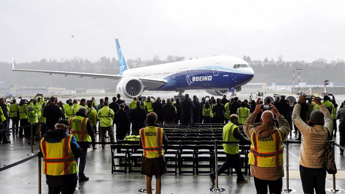 <strong>Enthusiastic welcome:</strong> Despite more subdued celebations than is customary at such events, the airplane was given an enthusiastic reception by Boeing employees after it landed.