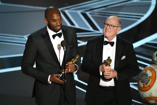 Bryant and filmmaker Glen Keane accept the 2018 Oscar for best animated short film. <a href="index.php?page=&url=http%3A%2F%2Fbelieveentertainmentgroup.com%2Fportfolio-item%2Fdear-basketball%2F" target="_blank" target="_blank">"Dear Basketball"</a> was based on <a href="index.php?page=&url=https%3A%2F%2Fwww.theplayerstribune.com%2Fen-us%2Farticles%2Fdear-basketball" target="_blank" target="_blank">a letter Bryant wrote</a> in 2015 announcing his retirement from basketball.