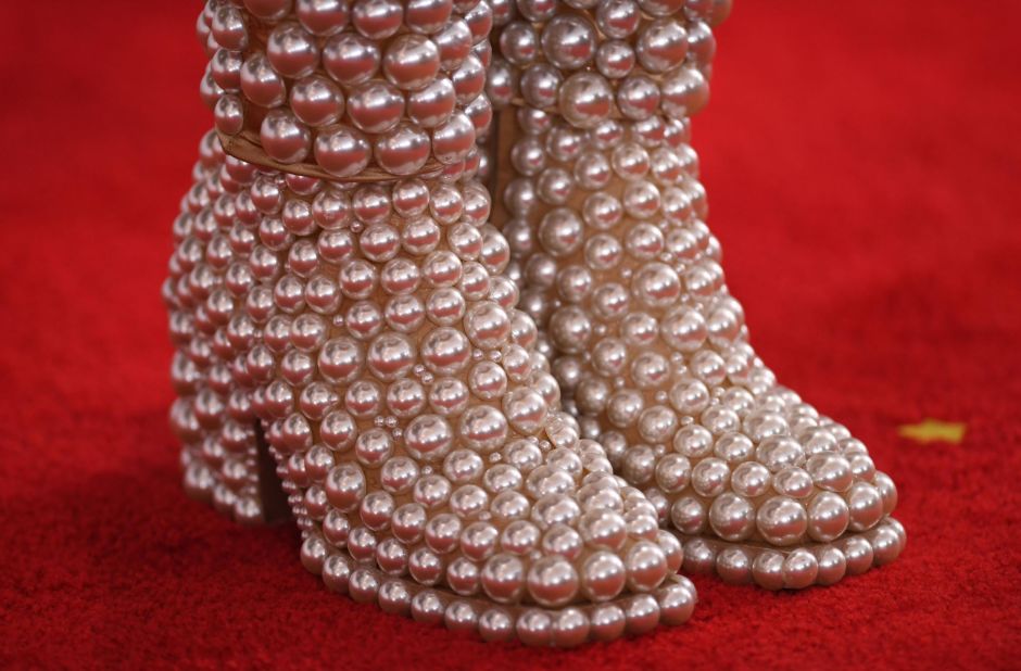 A close-up of Ross' pearl-covered boots. 