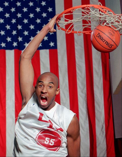 Bryant dunks the ball in his high school gym in Lower Merion, Pennsylvania, during a practice in 1996.