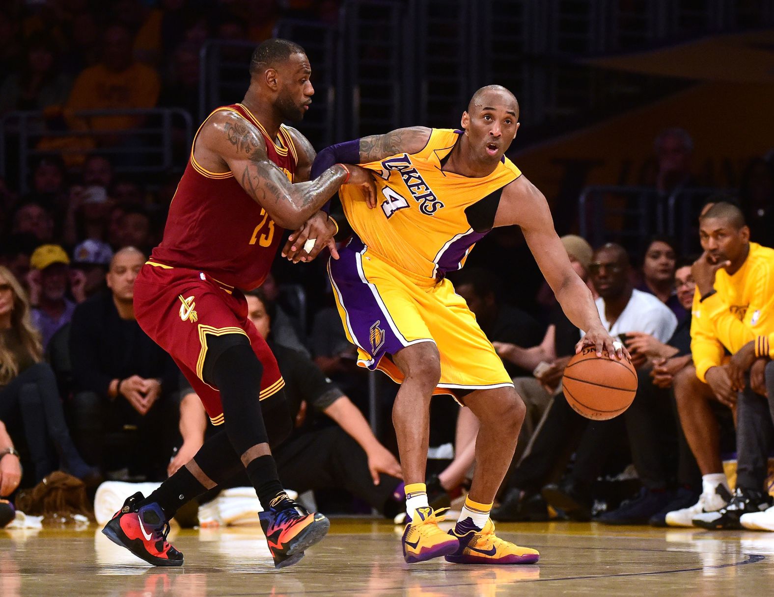 LeBron James guards Bryant during a 2016 game between the Cavaliers and Lakers in Los Angeles.