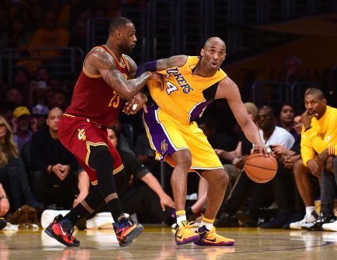 LeBron James guards Bryant during a 2016 game between the Cavaliers and Lakers in Los Angeles.