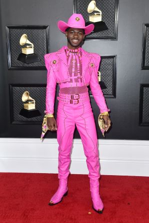 Lil Nas X in a head-to-toe hot pink Versace ensemble.