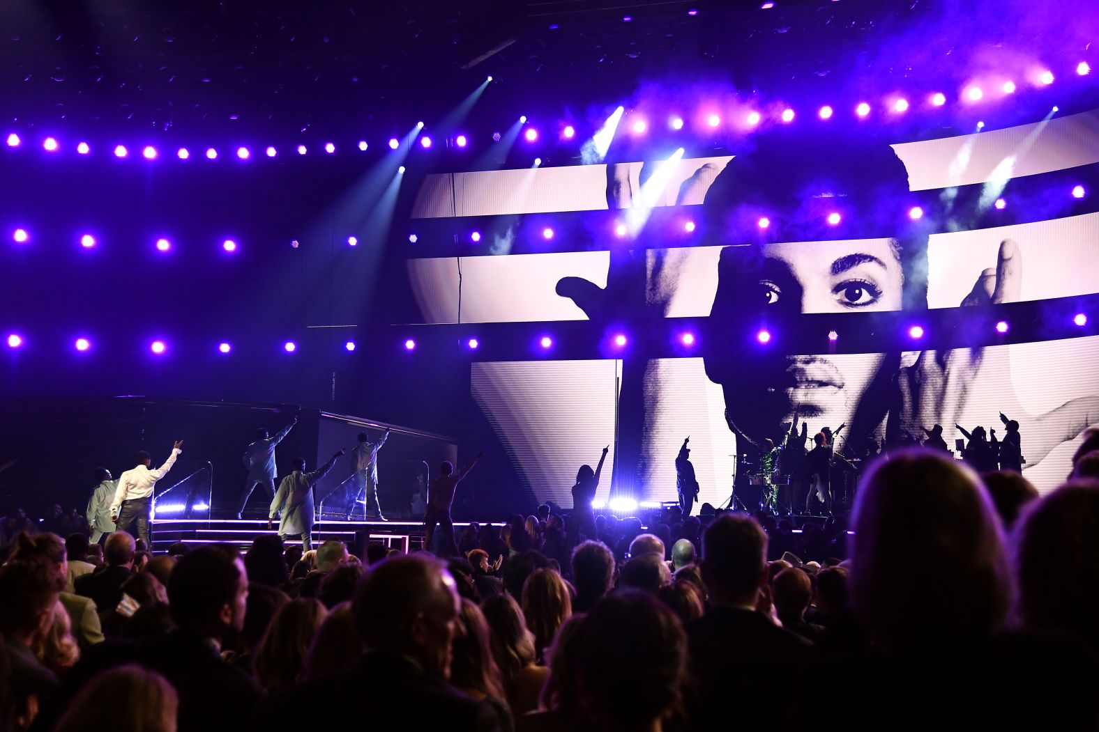 Usher performs a tribute to Prince.