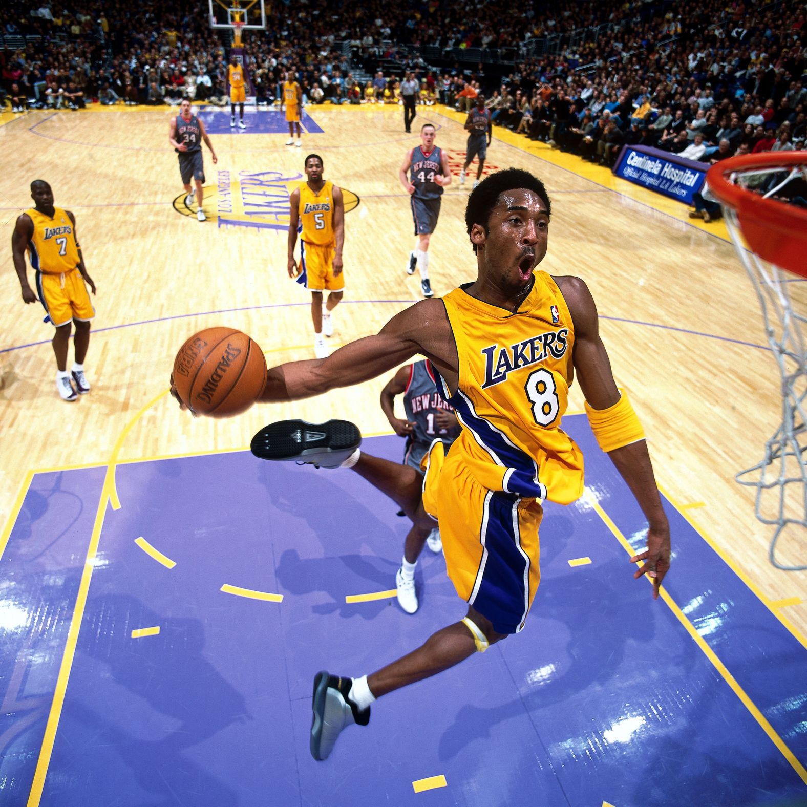 Bryant goes in for a slam dunk against the New Jersey Nets in January 2001.