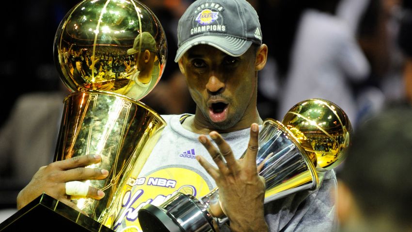 Kobe Bryant of the Los Angeles Lakers celebrates victory following Game 5 of the NBA Finals against the Orlando Magic at Amway Arena on June 14, 2009 in Orlando, Florida. The Lakers won the National Basketball Association championships defeating Orlando 99-86 for their 15th title and first since 2002. Bryant had 30 points, eight rebounds and six assists as the Lakers completed a four-games-to-one victory in the best-of-seven NBA Finals.   AFP PHOTO / Emmanuel Dunand (Photo credit should read EMMANUEL DUNAND/AFP via Getty Images)