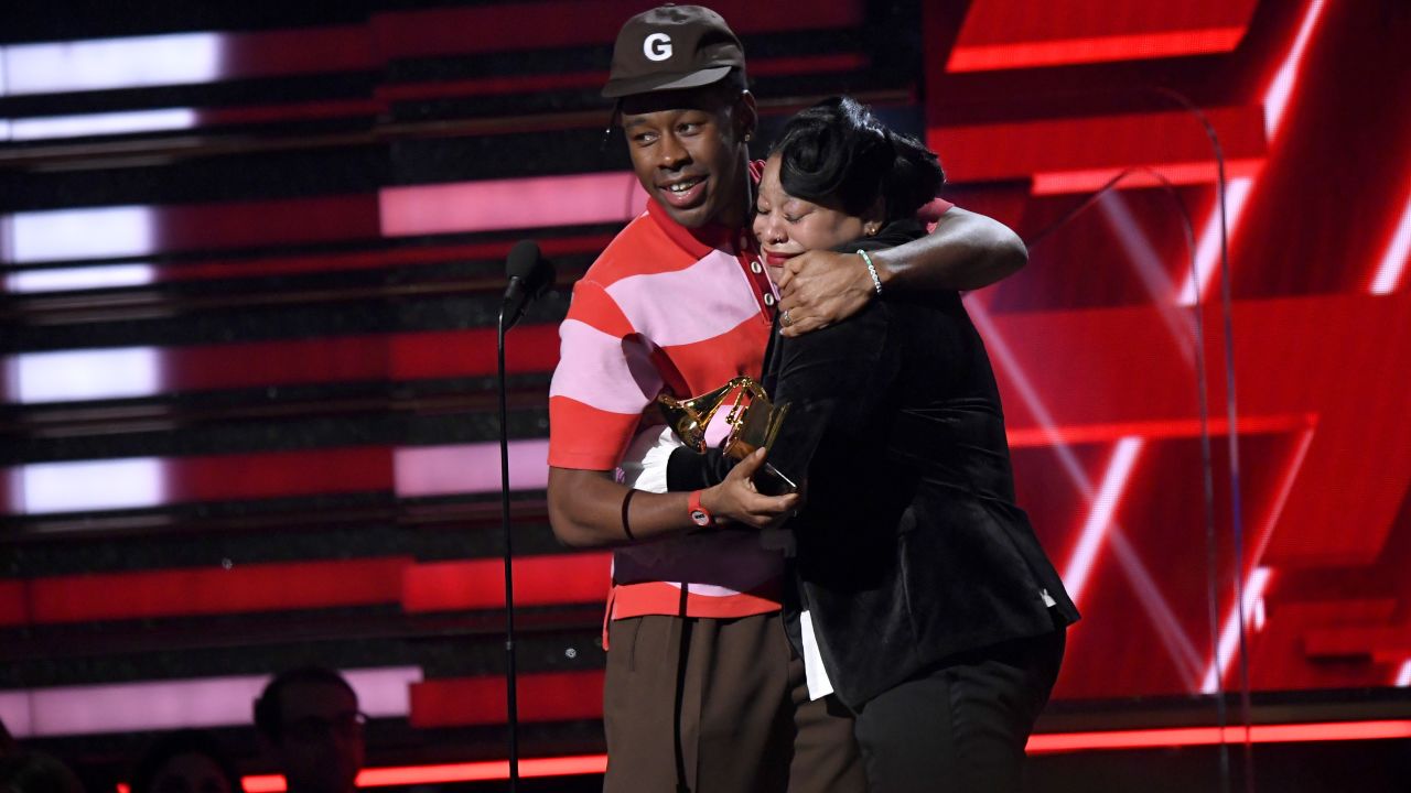 Tyler, the Creator and his mother accept the Best Rap Album award at the Grammys. (Photo by Kevork Djansezian/Getty Images)