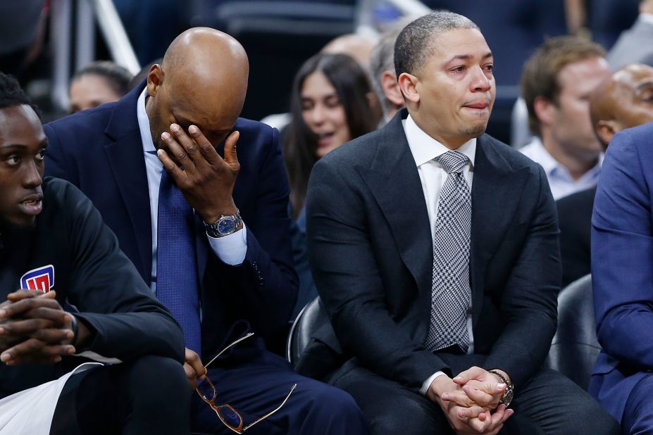 LA Clippers assistant coaches Sam Cassell and Tyronn Lue react on the bench after honoring Kobe Bryant during a game against the Orlando Magic at Amway Center in Orlando on Sunday.