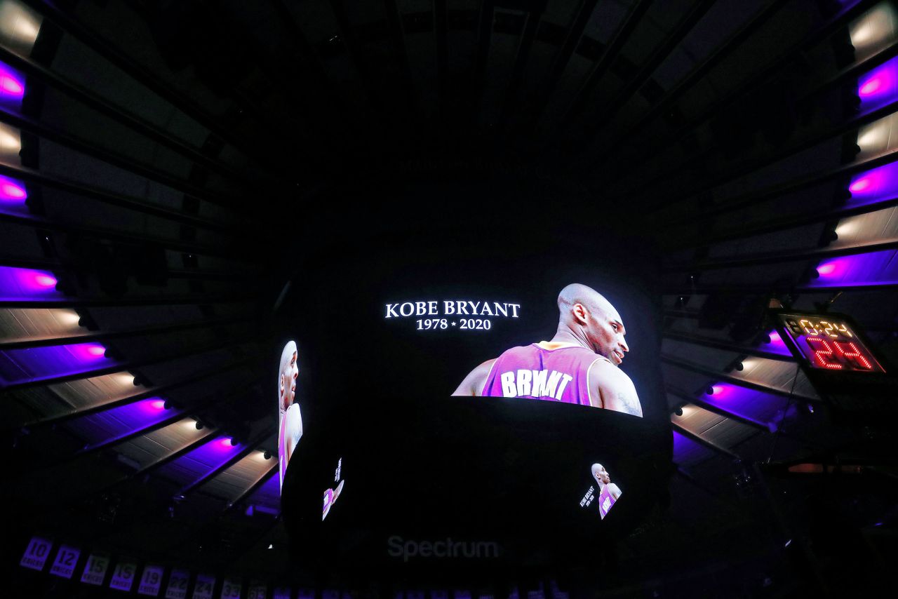 The ceiling of Madison Square Garden is lit in the colors of the Los Angeles Lakers as Bryant's picture is displayed during a moment of silence Sunday.