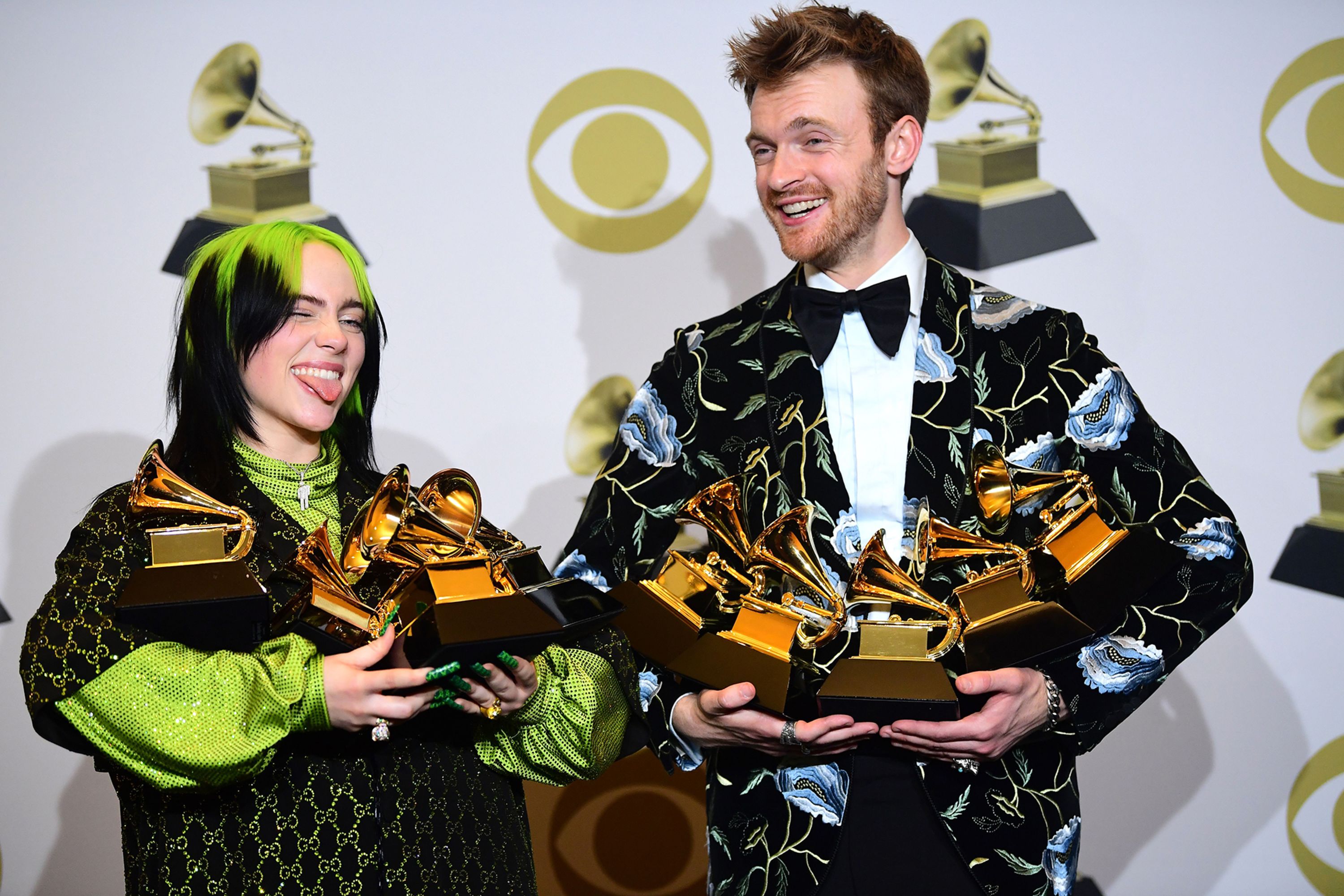 Billie Eilish and her brother and producer Finneas O'Connell pose in the press room with their awards for Album of the Year, Record of the Year, Best New Artist, Song of the Year and Best Pop Vocal Album after the 62nd Annual Grammy Awards on Sunday, January 26. <a href="index.php?page=&url=https%3A%2F%2Fwww.cnn.com%2F2020%2F01%2F27%2Fentertainment%2Fbillie-eilish-grammys%2Findex.html" target="_blank">The 18-year-old stole the night after sweeping the four biggest prizes.</a>