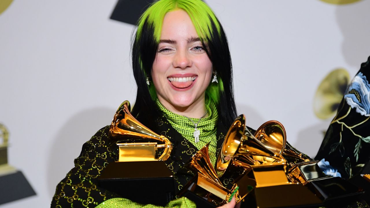 US singer-songwriter Billie Eilish poses in the press room with the awards for Album Of The Year, Record Of The Year, Best New Artist, Song Of The Year and Best Pop Vocal Album during the 62nd Annual Grammy Awards on January 26, 2020, in Los Angeles. (Photo by FREDERIC J. BROWN / AFP) (Photo by FREDERIC J. BROWN/AFP via Getty Images)