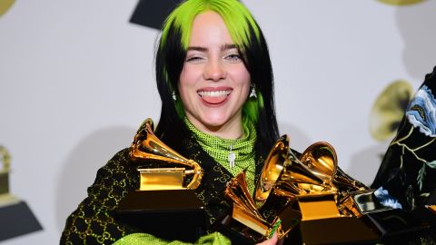 Billie Eilish poses with her many Grammy Awards. The singer will be performing at the Academy Awards, the Academy announced Wednesday.