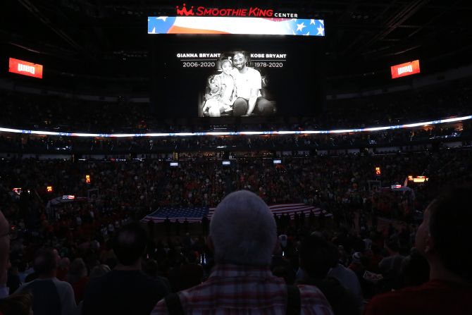 Fans observe a moment of silence for Kobe Bryant before a game between the New Orleans Pelicans and the Boston Celtics in New Orleans, Louisiana, on Sunday, January 26. The NBA legend and his daughter were among nine people aboard a helicopter that crashed in Calabasas, California, earlier in the day. <a href="index.php?page=&url=https%3A%2F%2Fwww.cnn.com%2F2013%2F04%2F13%2Fus%2Fgallery%2Fkobe-bryant%2Findex.html" target="_blank">See photos from Bryant's career. </a>