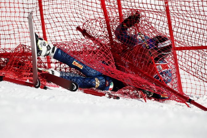 Italy's Guglielmo Bosca crashes into the net during the men's World Cup super-G in Kitzbuehel, Austria, on Friday, January 24.