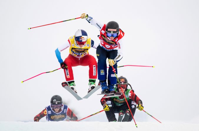 Sweden's Sandra Naslund, Switzerland's Fanny Smith, Canada's Marielle Thompson and Canada's Brittany Phelan compete in the FIS World Cup Women's Freestyle Skicross final in Idre, Sweden, on Sunday, January 26.