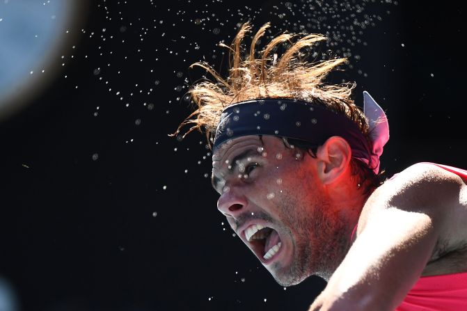 Rafael Nadal serves against Pablo Carreno Busta during Day 6 of the Australian Open on Saturday, January 25. 