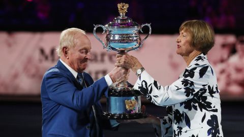 Margaret Court is presented with a replica trophy at the 2020 Australian Open.