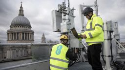 Engineers from EE the wireless network provider owned by BT Group Plc, inspect Huawei Technologies Co. 5G equipment overlooking St. Paul's Cathedral during trials in the City of London, U.K., on Friday, March 15, 2019. Europe would fall behind the U.S. and China in the race to install the next generation of wireless networks if governments ban Chinese equipment supplier Huawei Technologies Co. over security fears, according to an internal assessment by Deutsche Telekom AG. Photographer: Simon Dawson/Bloomberg via Getty Images