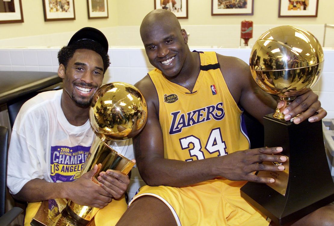 Kobe Bryant (L) celebrates with Shaquille O'Neal after winning the 2000 NBA Championship against the Indiana Pacers. The two superstars would be undone by a personality clash after their fourth trip to the finals, but became friends in retirement. 