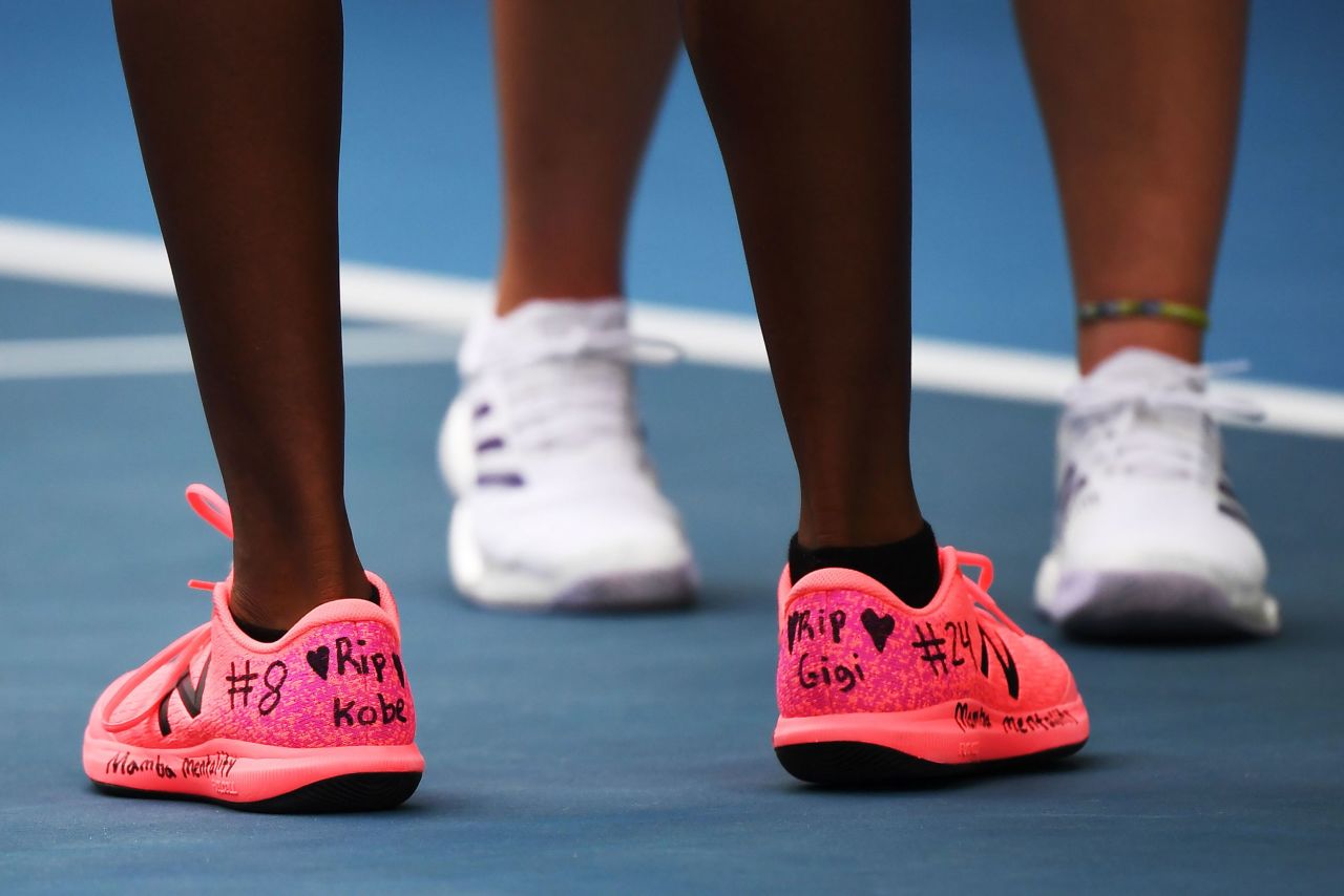 Coco Gauff pays tribute to Kobe Bryant and his daughter, Gianna, with their names hand-written on her tennis tennis shoes during her Australian Open doubles tennis match on January 27.