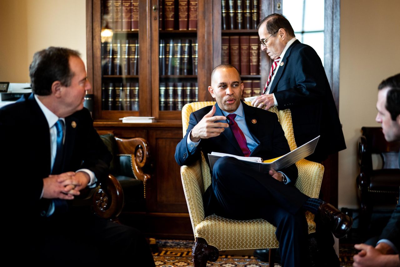 US Reps. Adam Schiff, Hakeem Jeffries, Jerry Nadler and other House managers meet in their anteroom before walking to the Senate floor on January 23.