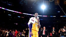 LOS ANGELES, CA - APRIL 13:  Kobe Bryant #24 of the Los Angeles Lakers addresses the crowd after scoring 60 points in his final NBA game at Staples Center on April 13, 2016 in Los Angeles, California. The Lakers defeated the Utah Jazz 101-96. NOTE TO USER: User expressly acknowledges and agrees that, by downloading and or using this photograph, User is consenting to the terms and conditions of the Getty Images License Agreement.  (Photo by Harry How/Getty Images)