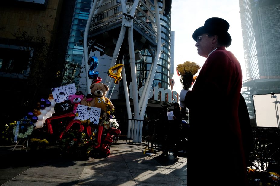 Gregg Donovan holds flowers at a memorial for Kobe Bryant near the Staples Center on January 27.