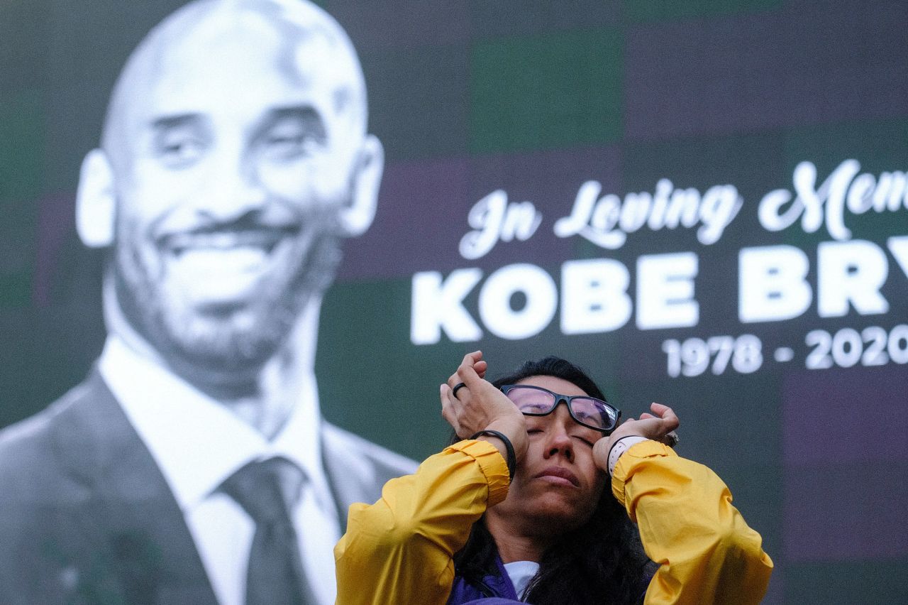 Nicole Mascarenhas wipes her eyes in front of the Staples Center on January 27.
