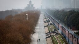 WUHAN, CHINA - JANUARY 27: (CHINA-OUT) Two residents walk in an empty Jiangtan park on January 27, 2020 in Wuhan, China. As the death toll from the coronavirus reaches 80 in China with over 2700 confirmed cases, the city remains on lockdown for a fourth day. (Photo by Getty Images)