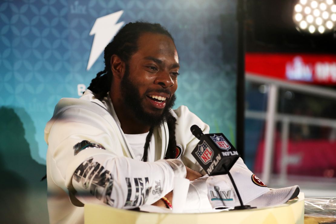 Sherman speaks to the media during Super Bowl Opening Night.