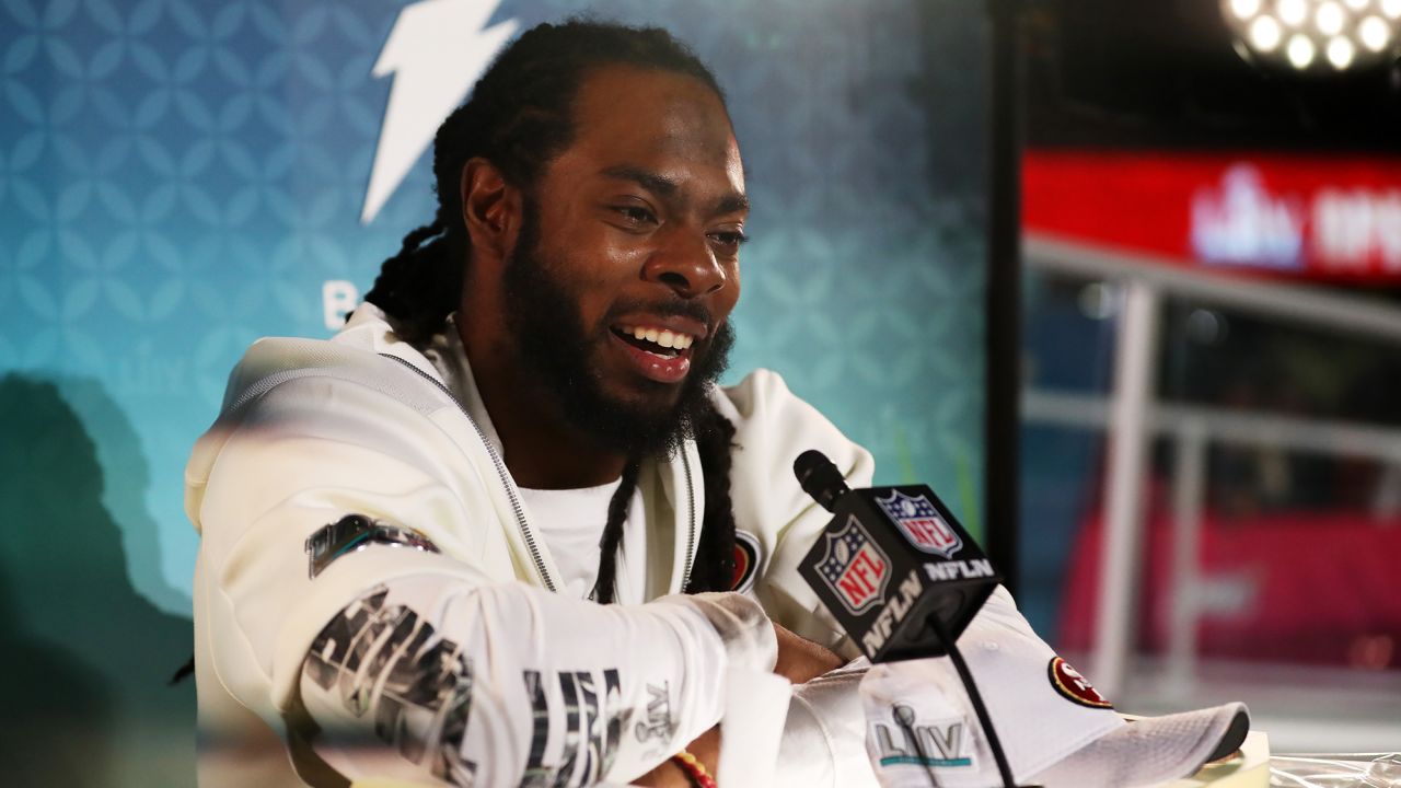 Sherman speaks to the media during Super Bowl Opening Night.