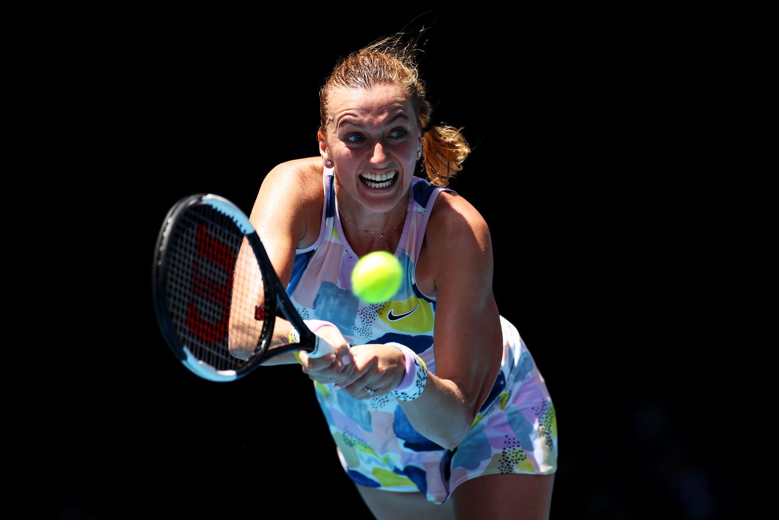 Petra Kvitova plays a backhand against Australian Ashleigh Barty. After a tight first set, Barty triumphed 7-6 6-2 to reach the semifinals.