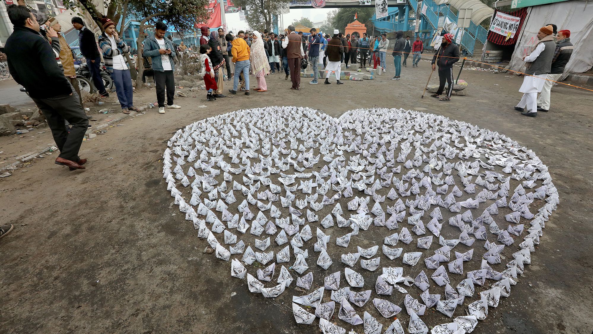 A heart made of paper boats with slogans on them rests near a protest in the Shaheen Bagh neighborhood in New Delhi on Wednesday, January 16.