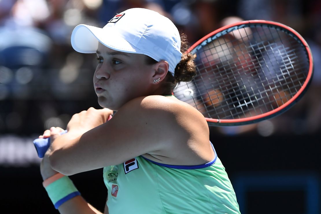 Australia's Ashleigh Barty hits a return against Czech Republic's Petra Kvitova during their women's singles quarterfinal match at the Australian Open tennis tournament in Melbourne on January 28, 2020.