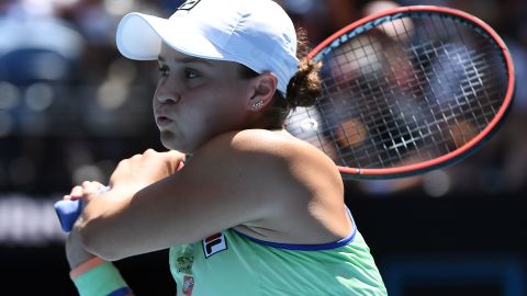 Australia's Ashleigh Barty hits a return against Czech Republic's Petra Kvitova during their women's singles quarterfinal match at the Australian Open tennis tournament in Melbourne on January 28, 2020.