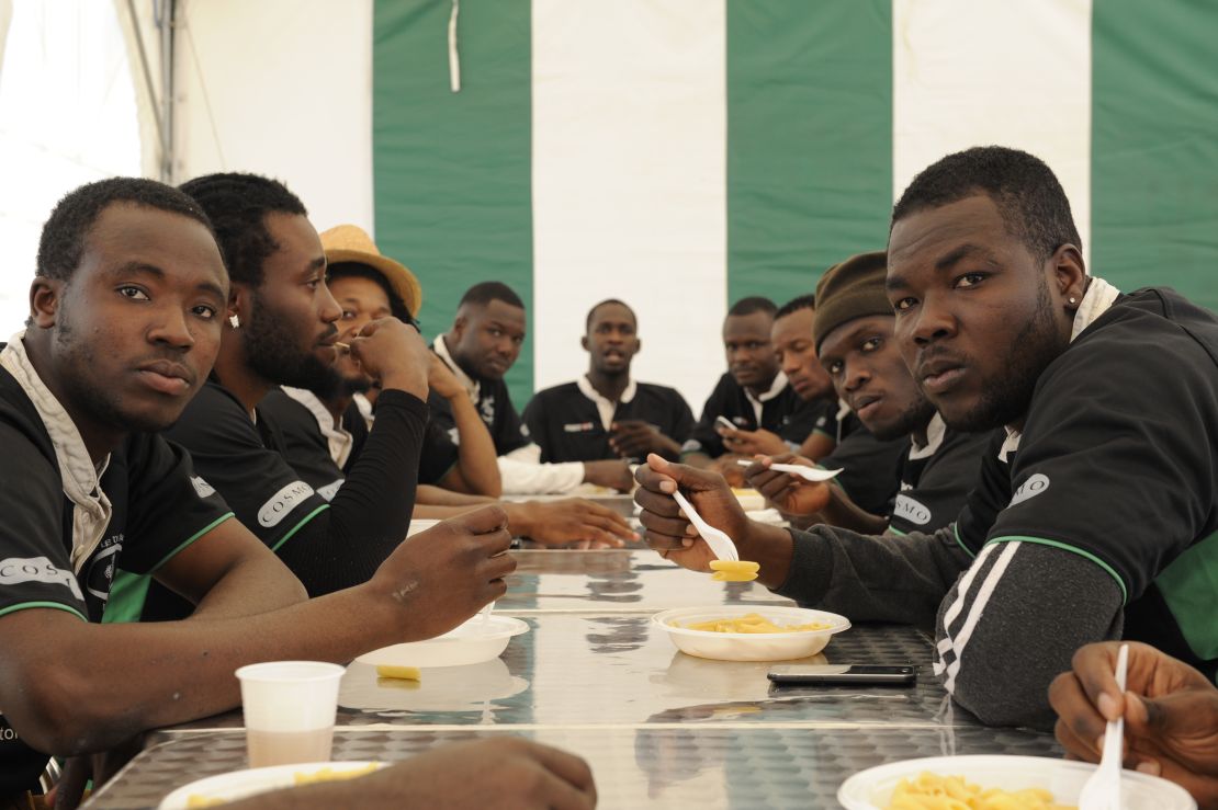 Tre Rose players share a meal in Casale Monferrato, where the club is based. 