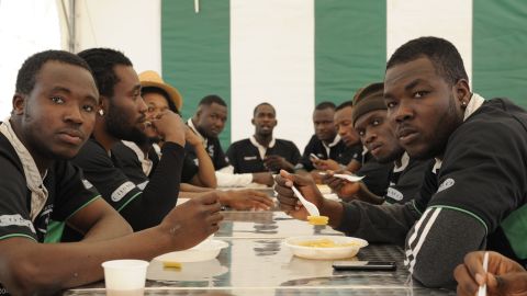 Tre Rose players share a meal in Casale Monferrato, where the club is based. 