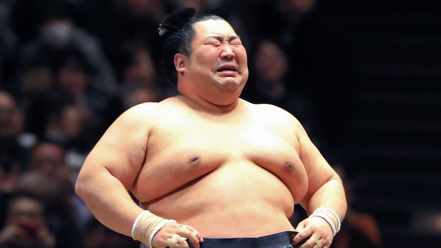 Tokushoryu sheds tears of joy after winning the tournament at the Ryogoku Kokugikan in Tokyo, Japan. 