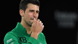 Serbia's Novak Djokovic gets emotional as he talks about Kobe Bryant after winning the men's singles quarter-final match against Canada's Milos Raonic on day nine of the Australian Open tennis tournament in Melbourne on January 28, 2020. (Photo by Greg Wood / AFP) / IMAGE RESTRICTED TO EDITORIAL USE - STRICTLY NO COMMERCIAL USE (Photo by GREG WOOD/AFP via Getty Images)