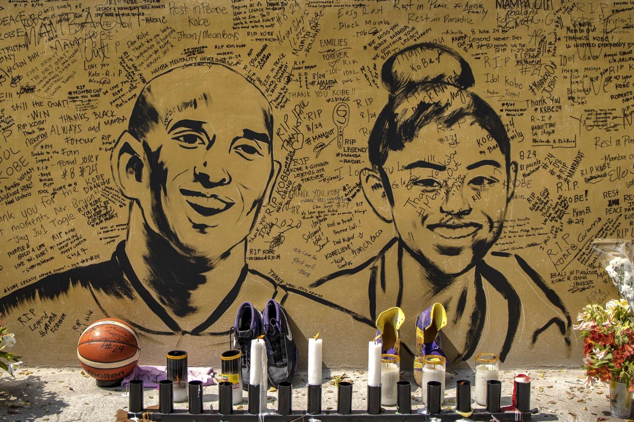 Notes are seen on a wall with painted portraits of Kobe Bryant and his daughter Gianna outside the "House of Kobe" basketball court on January 28 in Valenzuela, Metro Manila, Philippines.