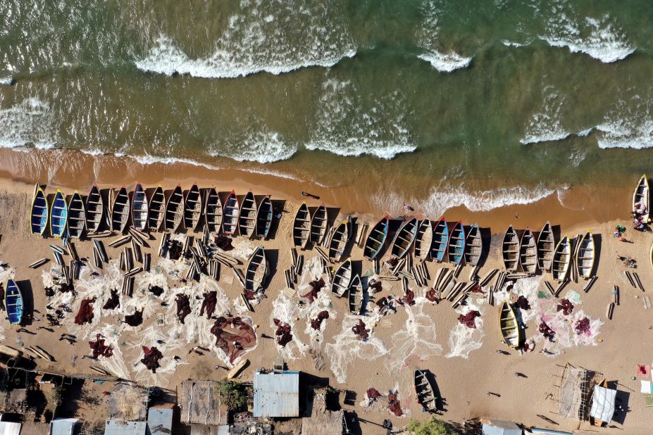 An aerial view of fishing boats on the shore of the Lake Malawi, in Senga, Malawi. With an area of more than 11,000 square miles, "Lake Malawi probably has the highest density of vertebrate species on the planet," says Darwall.