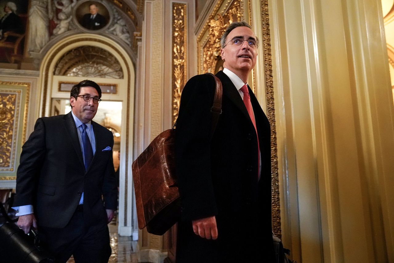 Trump's personal lawyer Jay Sekulow and White House Counsel Pat Cipollone arrive at the Senate chamber on January 28.