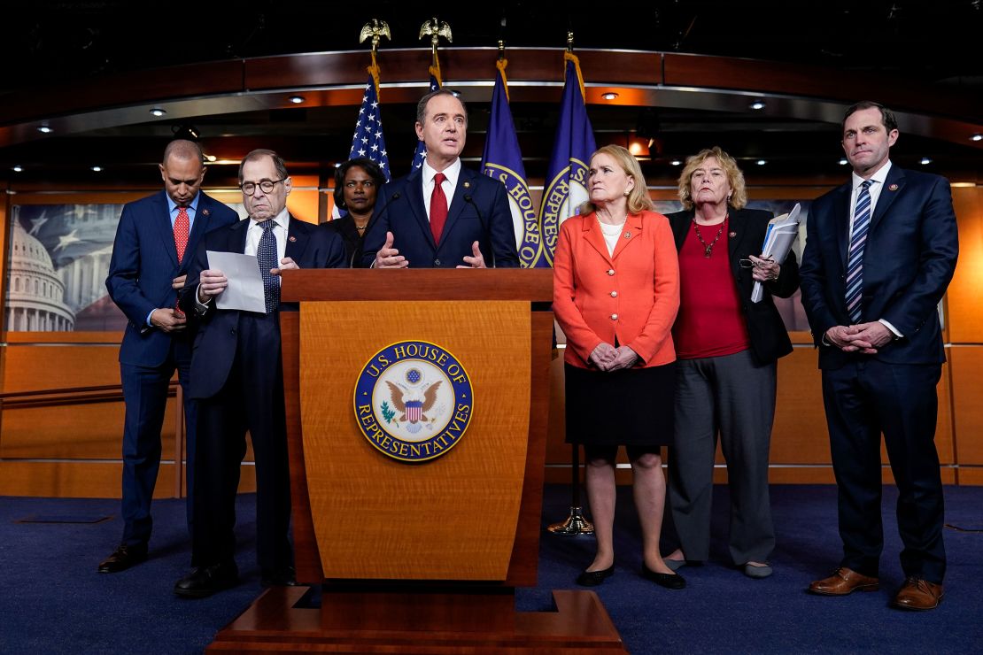 Rep. Jason Crow is pictured on the far right side accompanied by his fellow impeachment managers in January 2020.