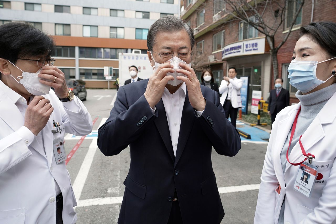 South Korean President Moon Jae-in wears a mask to inspect the National Medical Center in Seoul on January 28.
